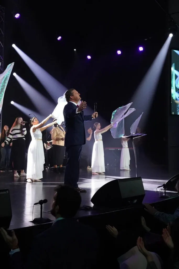 Apostle Hallam during worship service